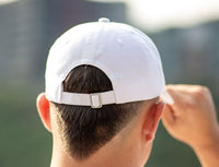 White Vol Navy Hat